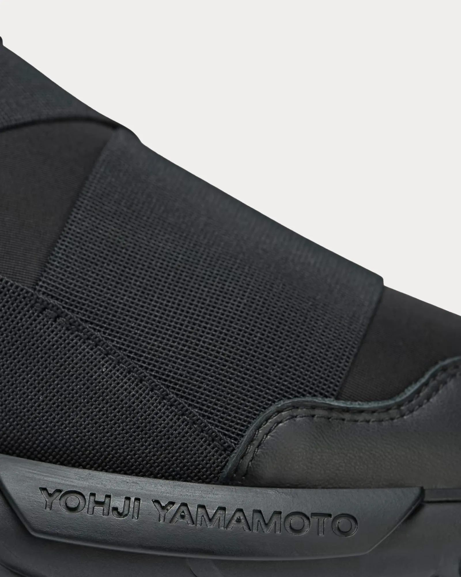 Qasa Black Mid Top Sneakers